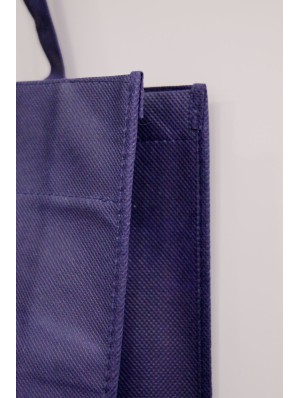 Bolsas de TNT troqueladas con asas largas 44x38+10 cm.