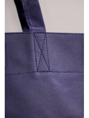 Bolsas de TNT troqueladas con asas largas 44x38+10 cm.