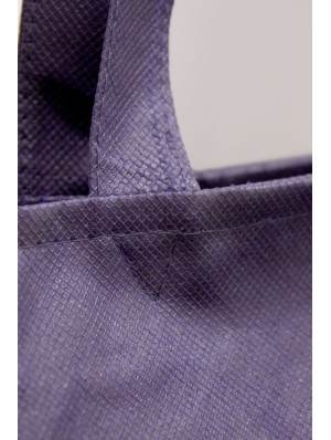 Non-woven bag with bottom gussep, zip closure and pocket 48x36+10 cm.